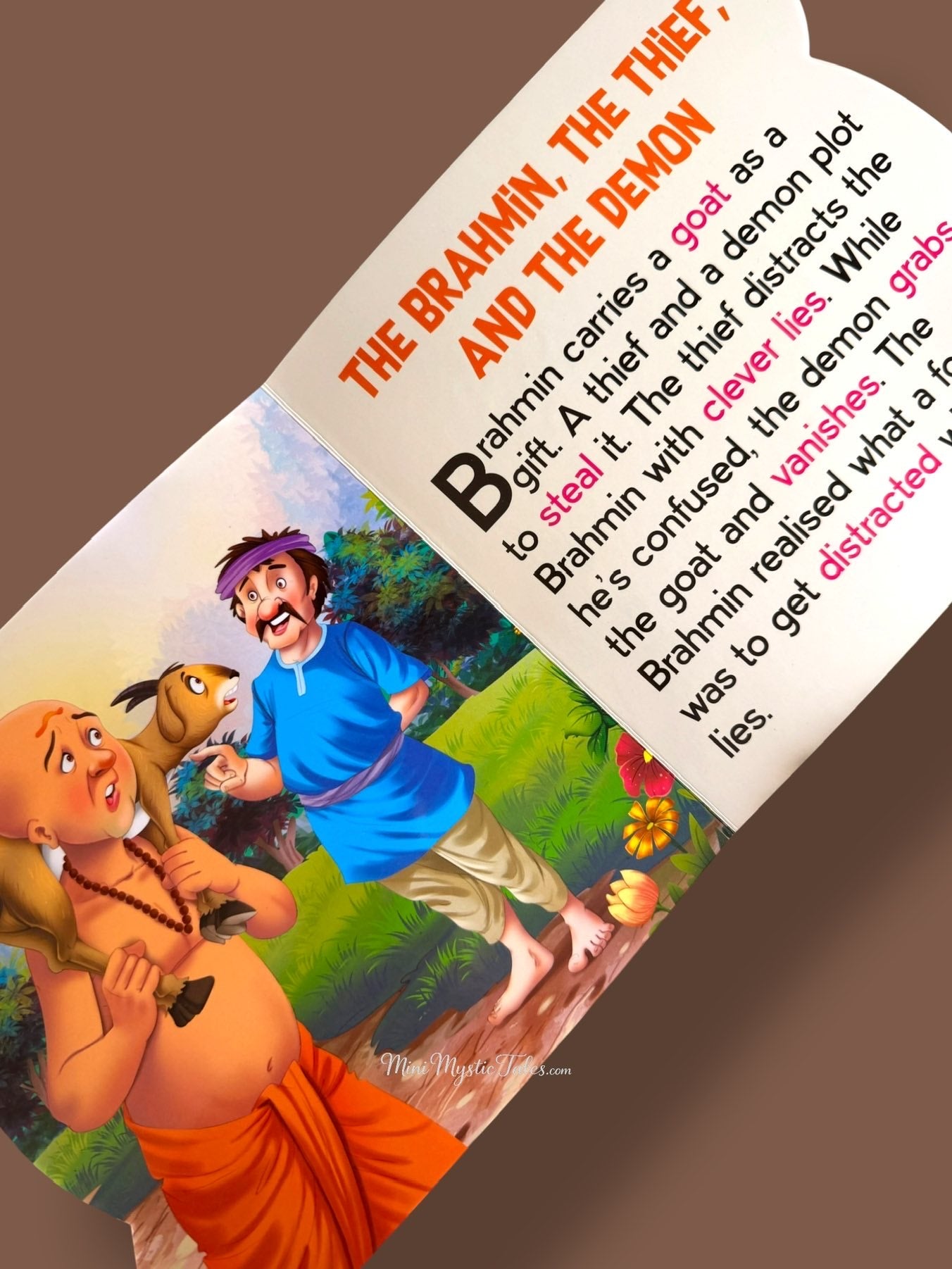 Inside page of 5 in 1 Panchatantra Tales board book featuring The Brahmin, the Thief and the Demon story with large print keywords