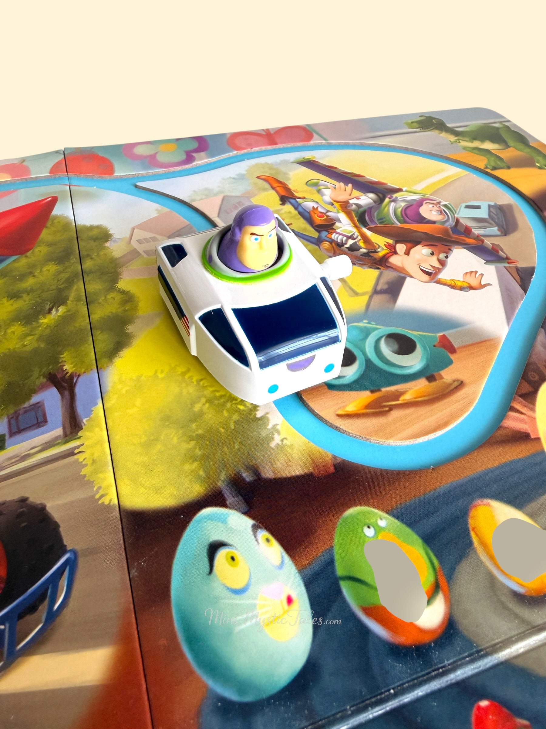 Close-up of Buzz Lightyear wind-up toy included with the Disney Pixar Toy Story storybook and play track set