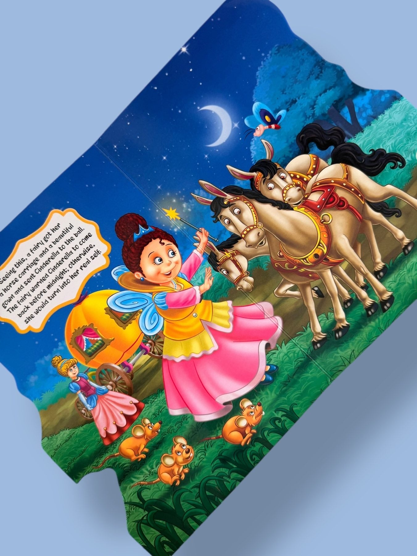 Cinderella Story Board Book page featuring the Fairy Godmother transforming Cinderella with a magical carriage and horses