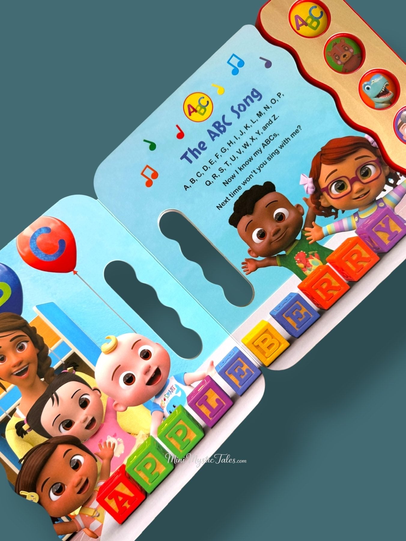 CoComelon sound book inside page featuring the ABC Song with colourful illustrations and interactive sound button