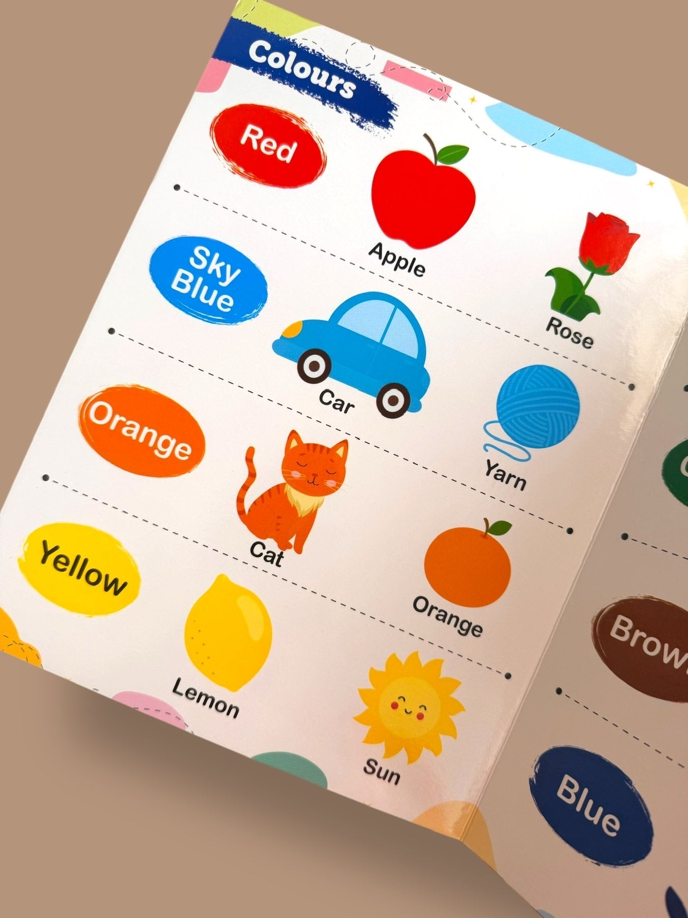 Colours learning page teaching red, sky blue, orange, and yellow with everyday objects like apple, car, rose, lemon, and sun
