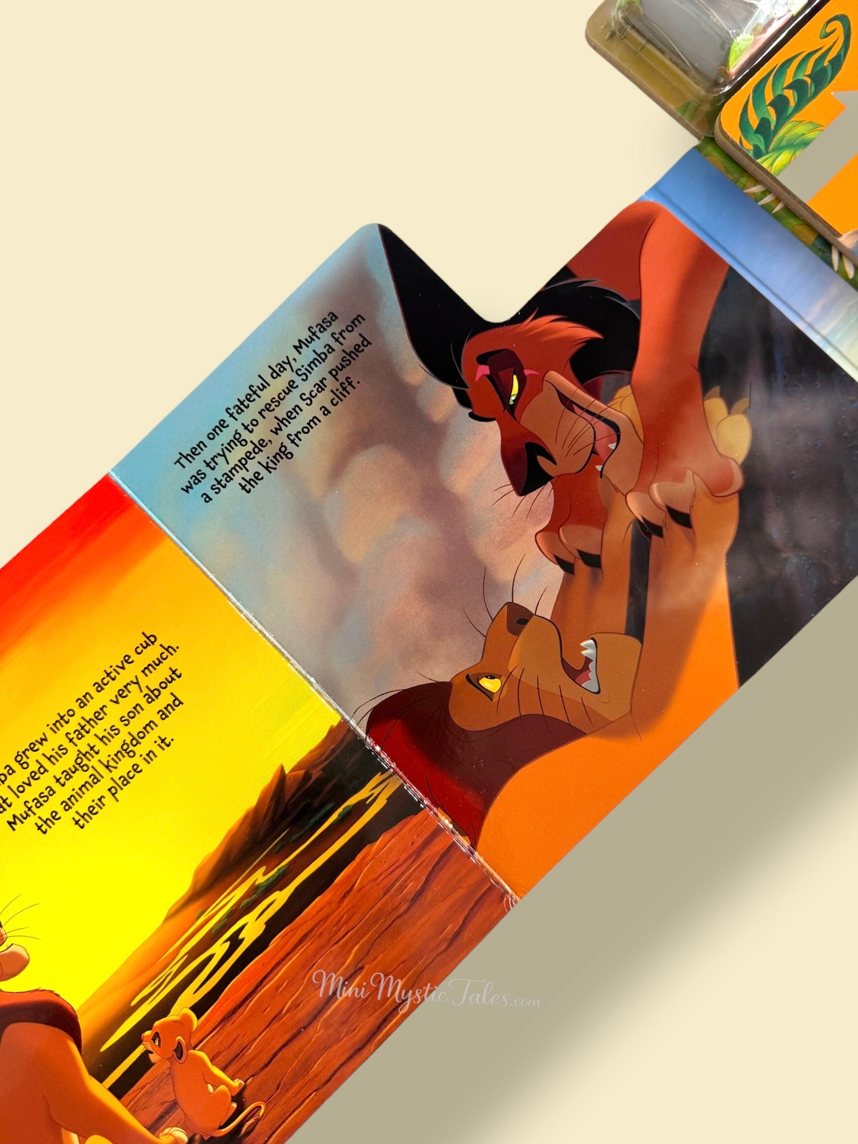 Illustrated Lion King story page showing Scar and Mufasa from Disney’s classic adventure tale