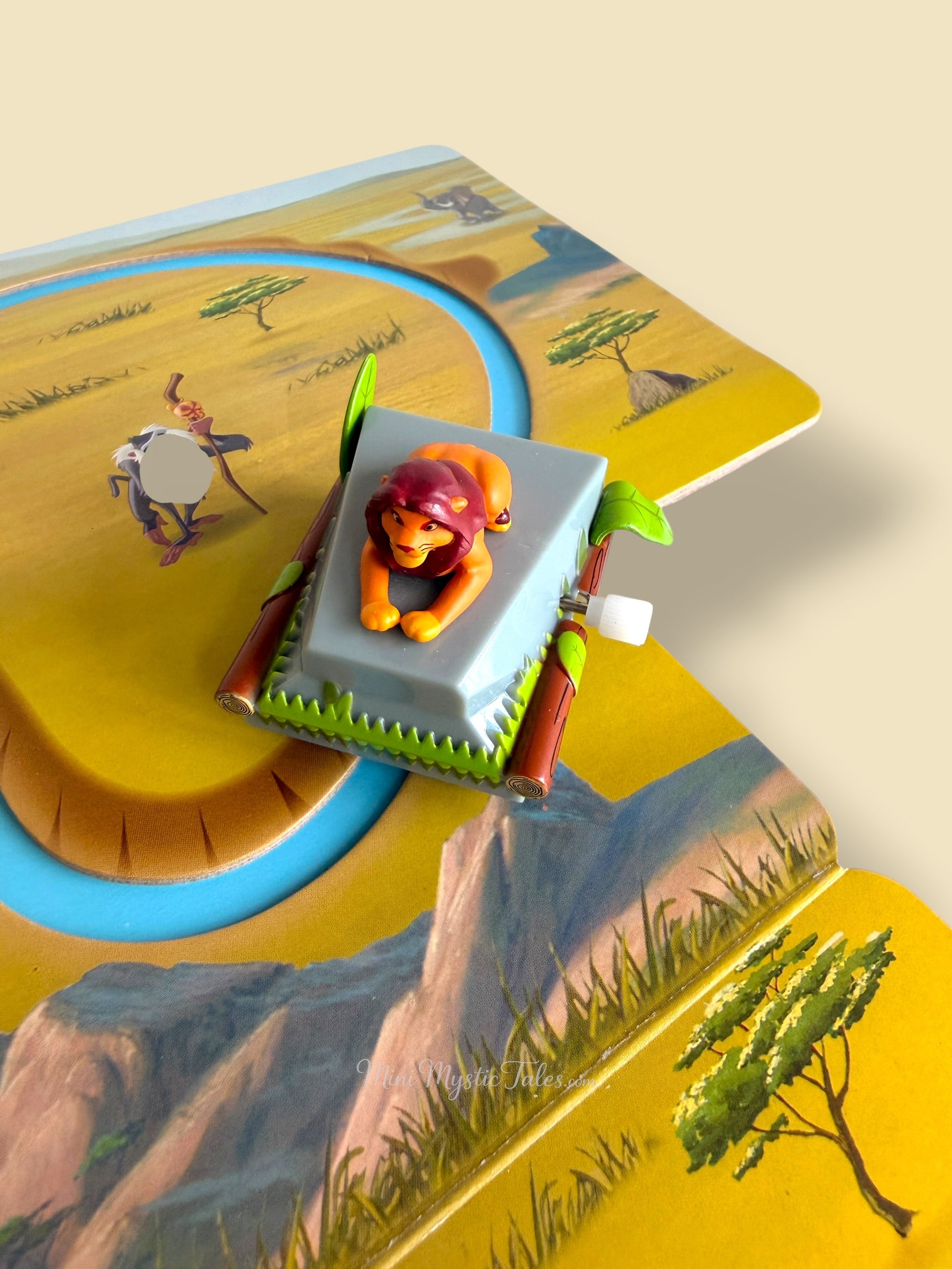 Close-up of Simba wind-up toy included with Disney The Lion King storybook and play track set