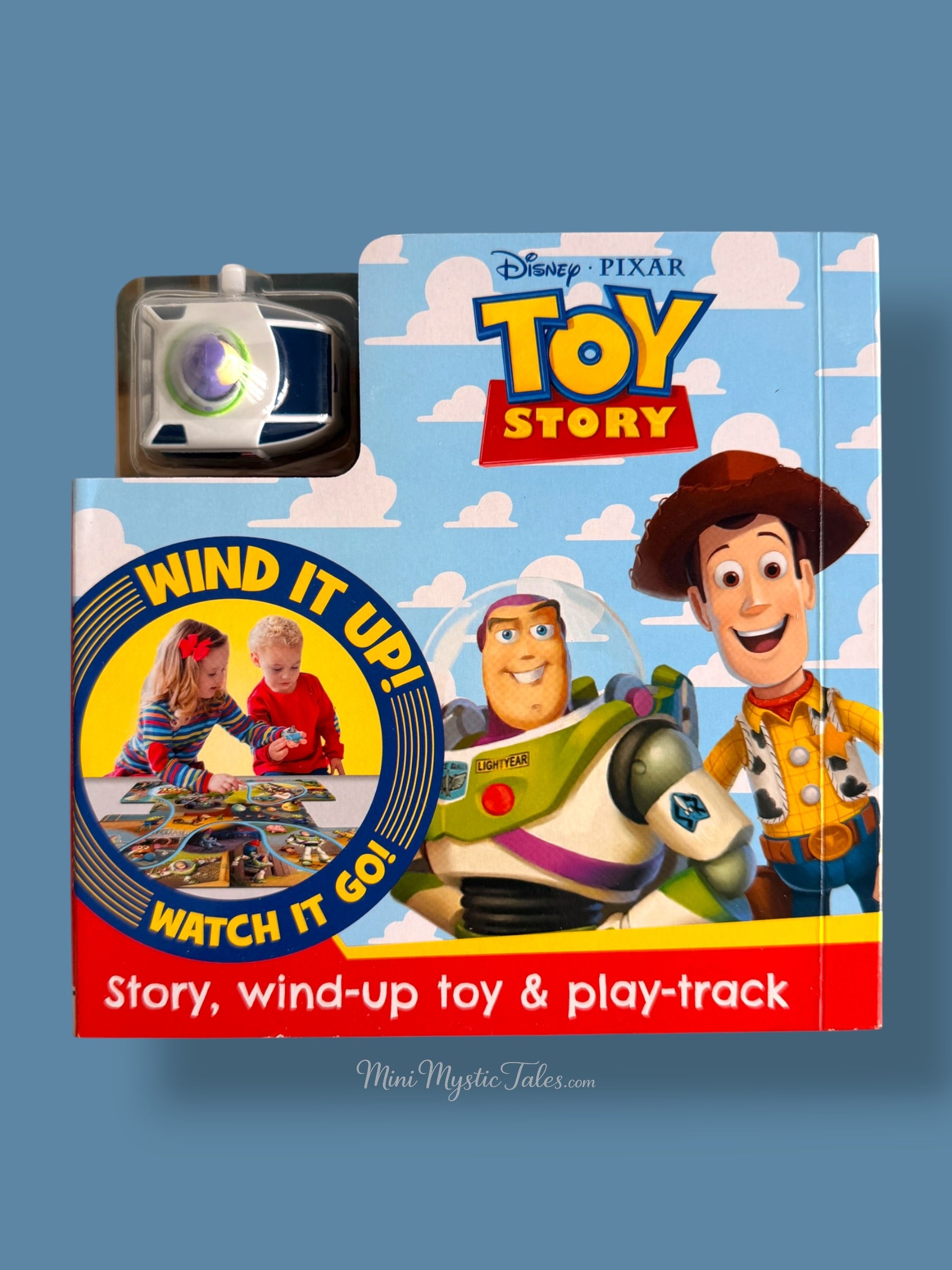 Disney Pixar Toy Story interactive story book with Buzz Lightyear wind-up toy and fold-out play track