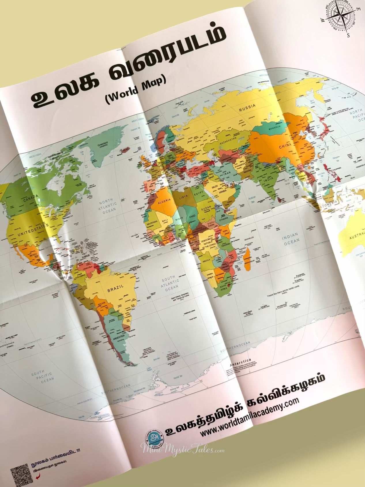 World map reference page from En Suvadi Vaaippaadu Tamil educational book for children