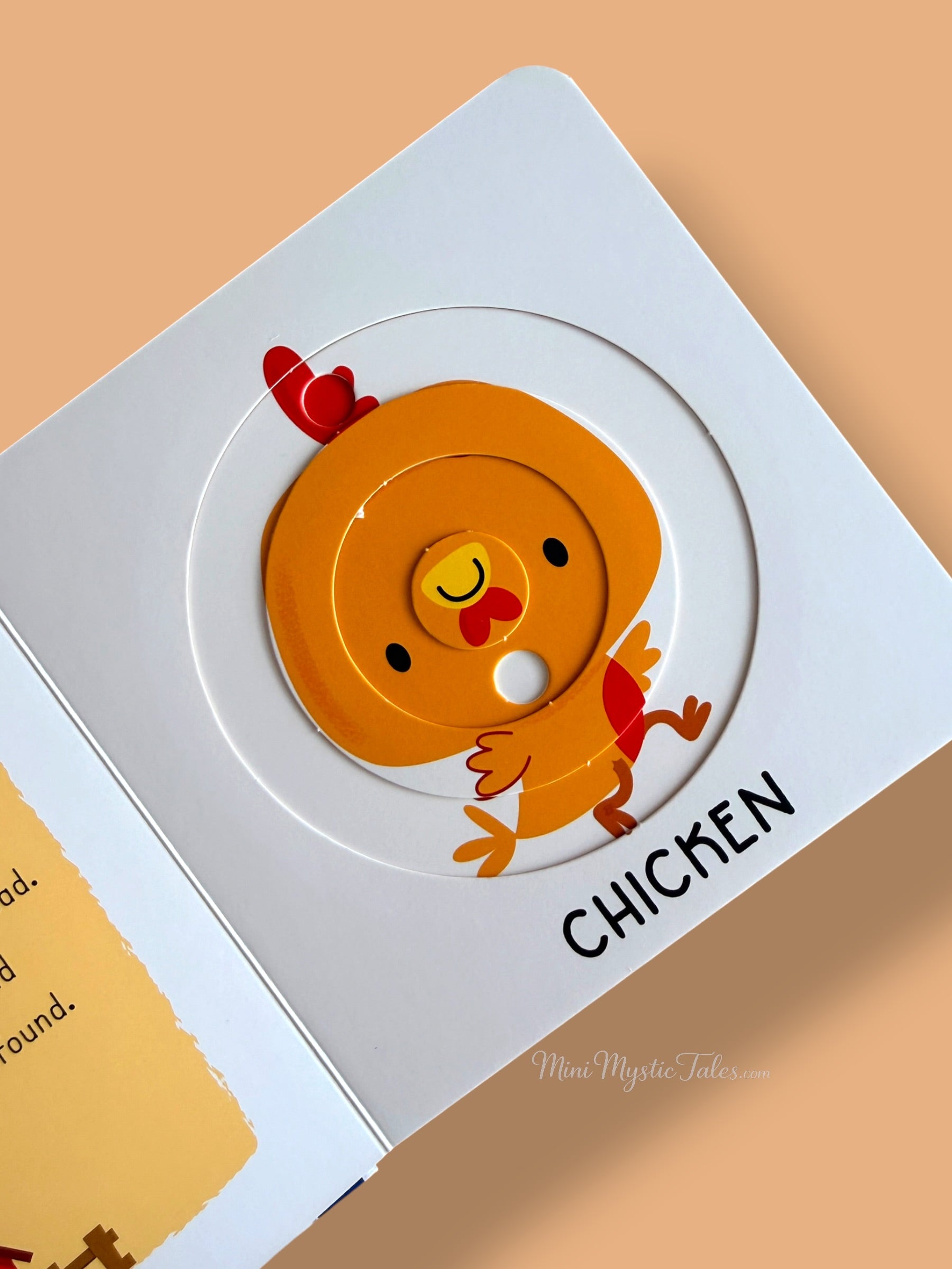 Completed chicken puzzle in an interactive farm animals board book for young children