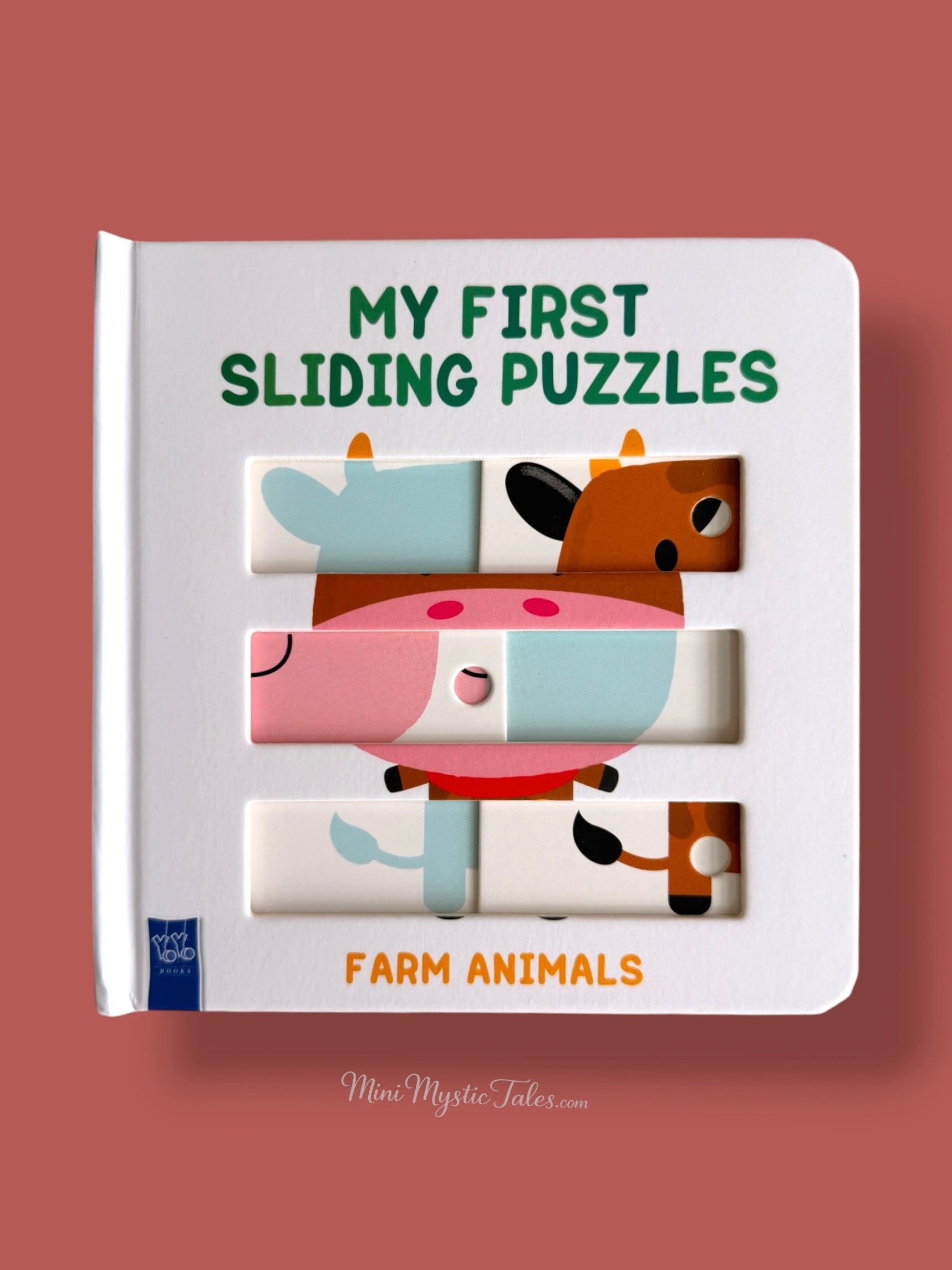 Sliding puzzle activity page with a farm animal cow that children can rearrange and complete
