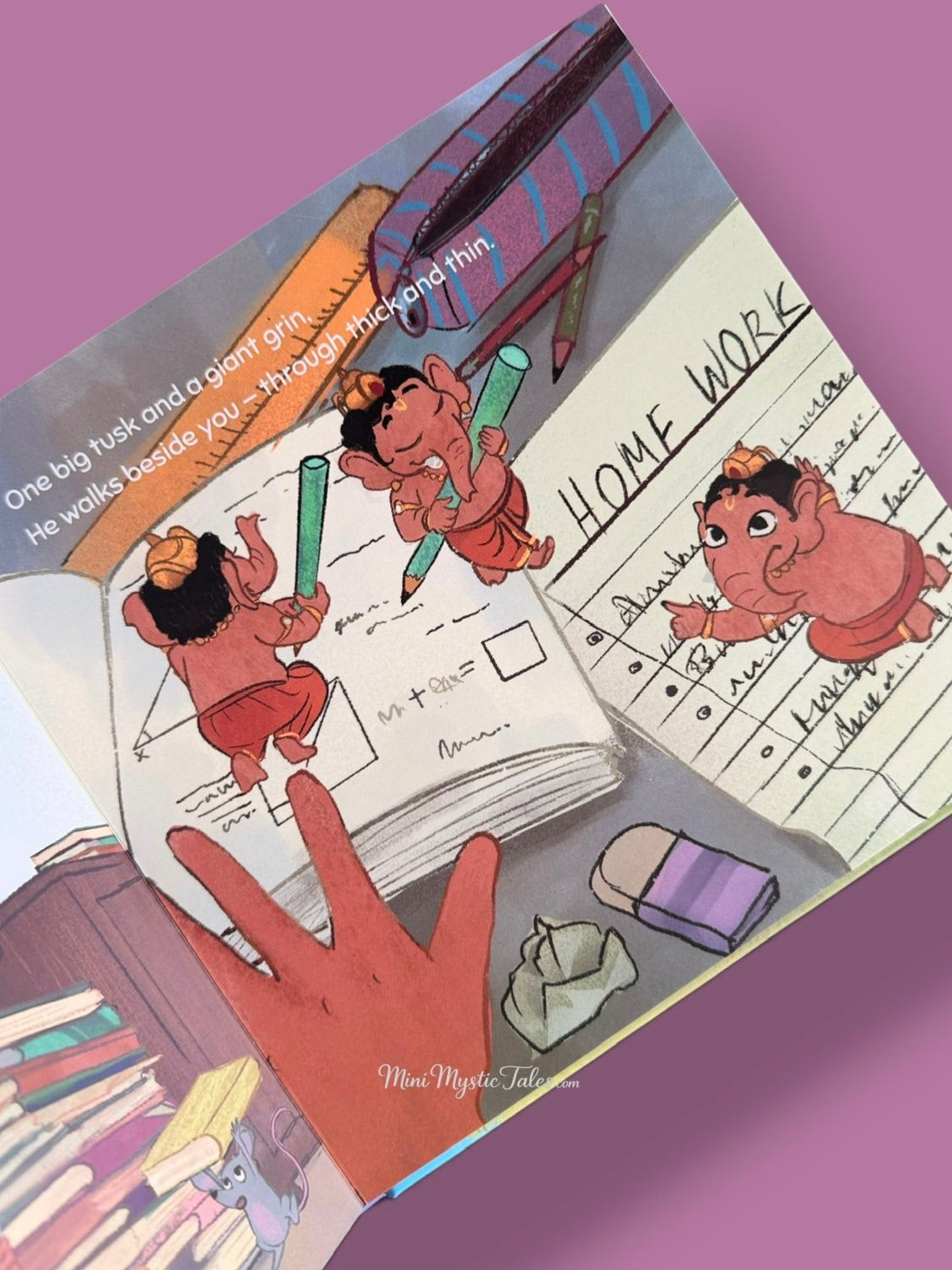 Big G creatively tackling his homework in an illustrated Ganesha-inspired storybook for young children.