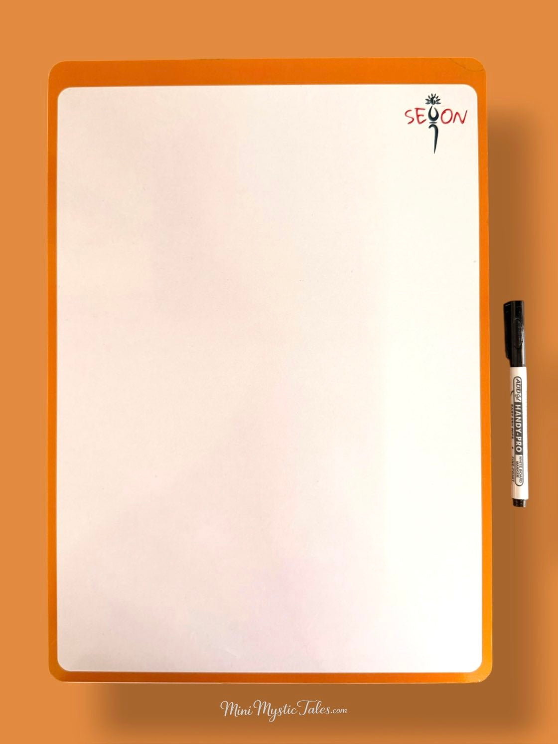 Reusable blank writing board for children with marker pen, designed for repeated Hindi handwriting practice, drawing, letter formation, and early learning activities.