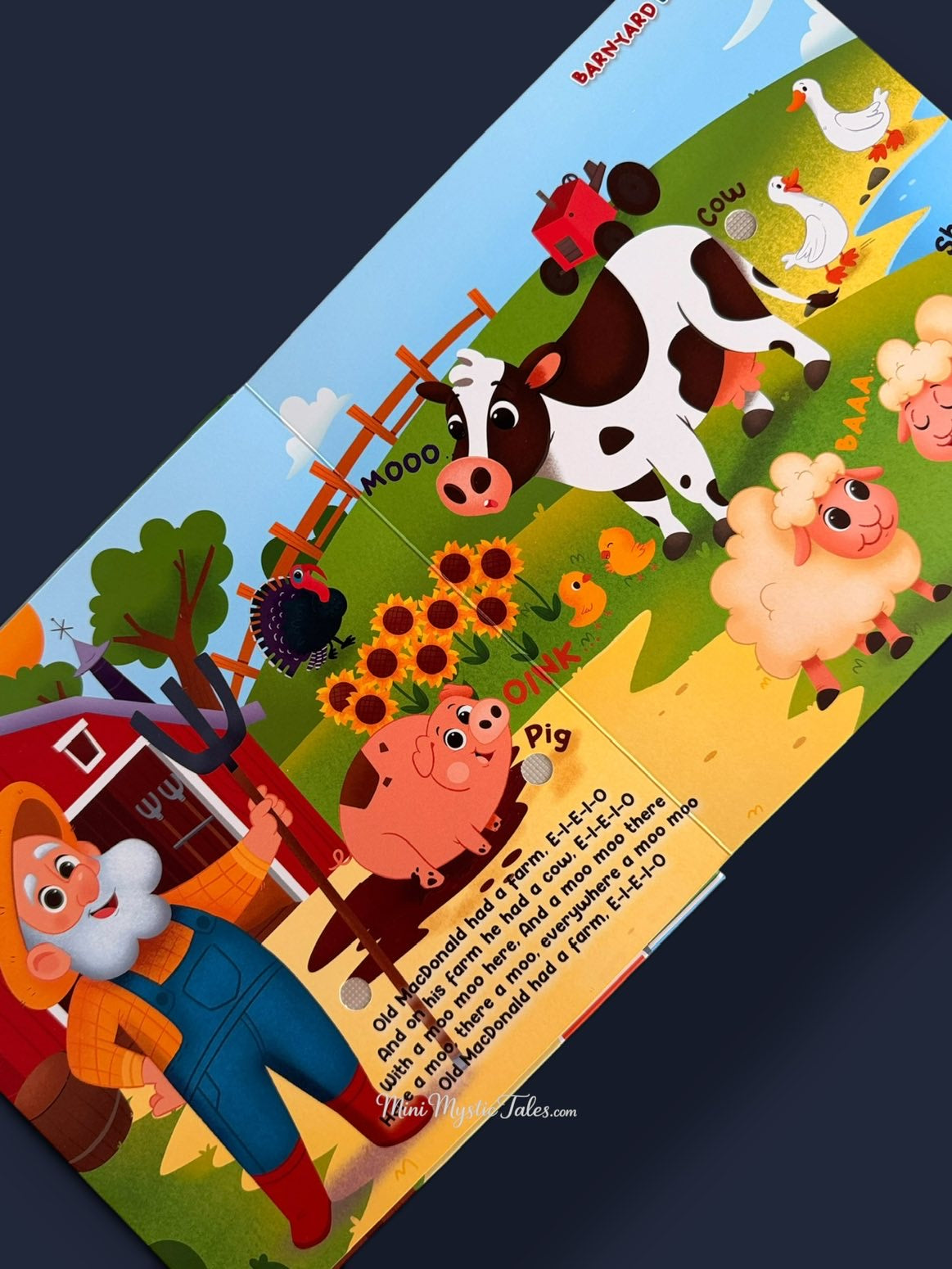 Interactive farm scene from Little Explorer’s Big Journey with press-and-listen animal sounds and Old MacDonald nursery rhyme.