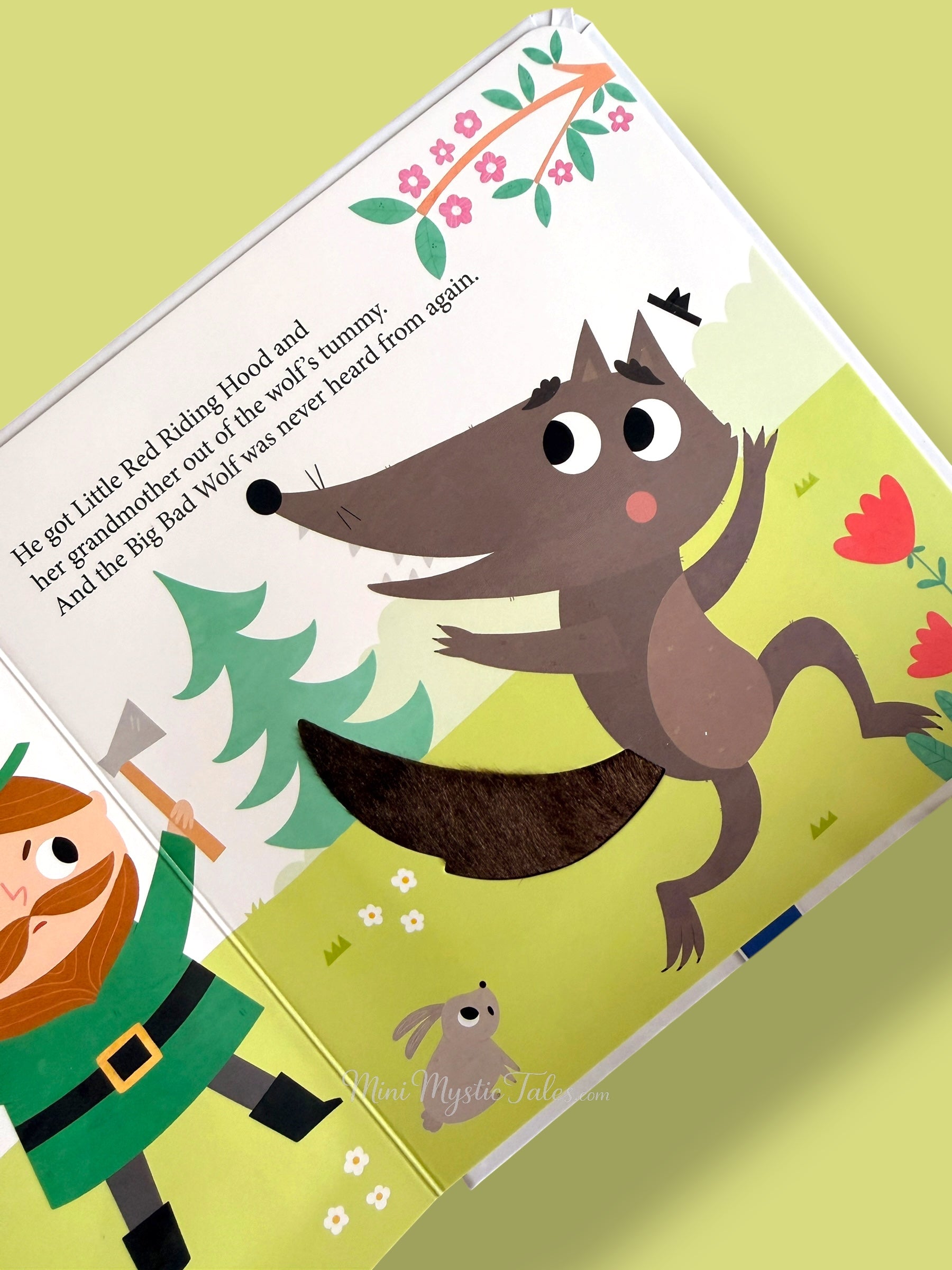 Final story page from Little Red Riding Hood touch and feel board book with big bad wolf