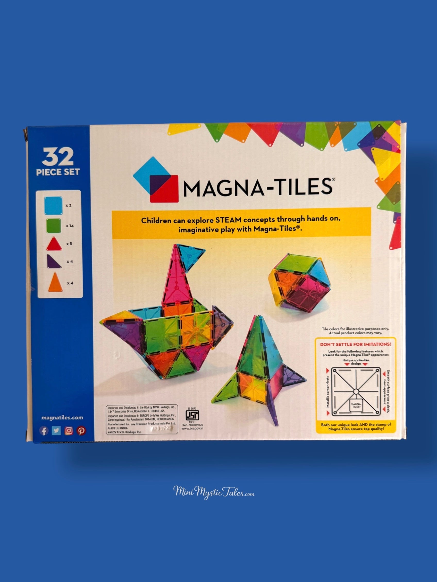Back of Magna-Tiles Clear Colors 32 Piece Set showing included magnetic tile pieces and creative building ideas