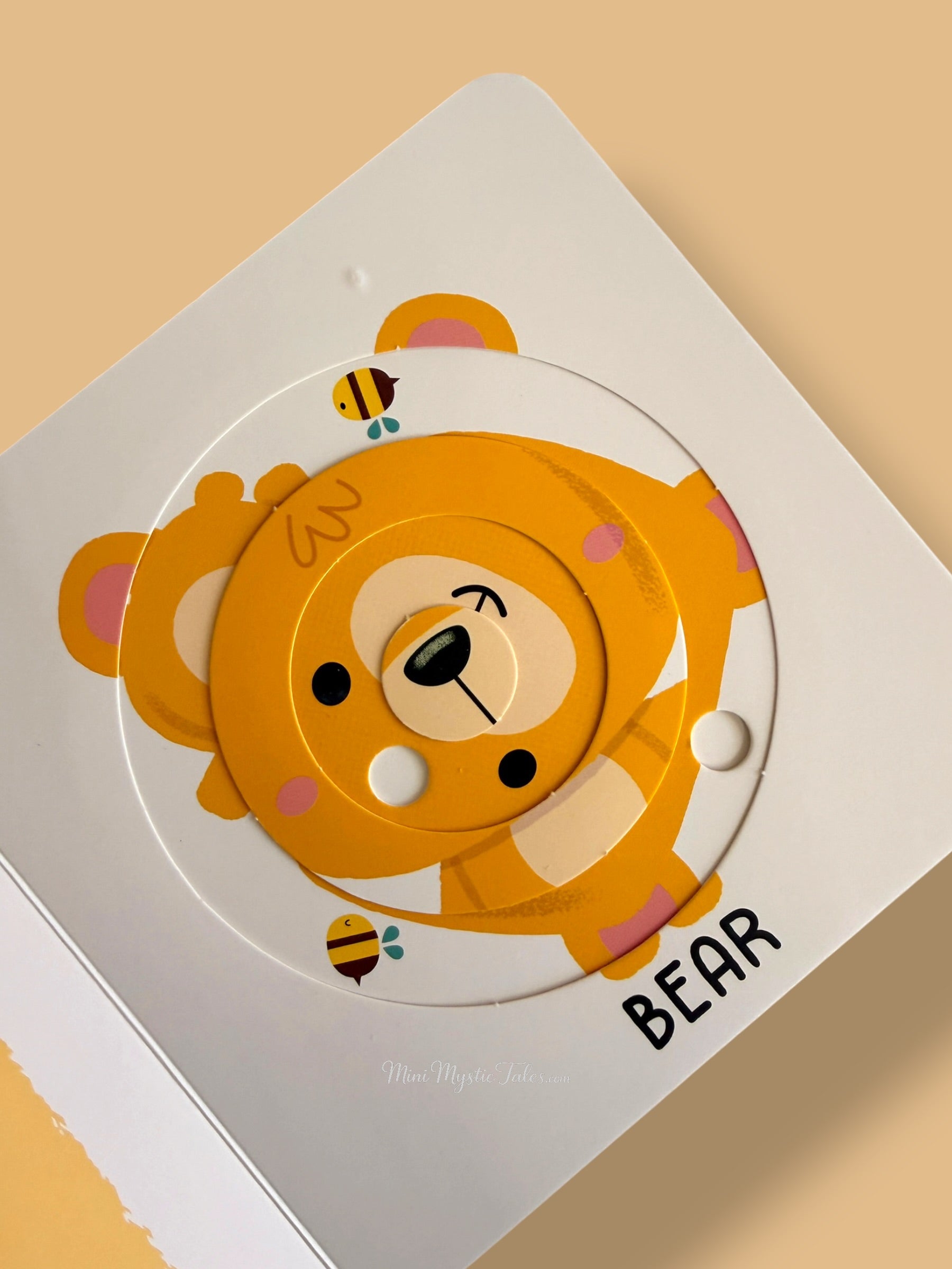 Interactive rotating bear puzzle activity from My First Sliding Puzzles Countryside Animals board book for toddlers