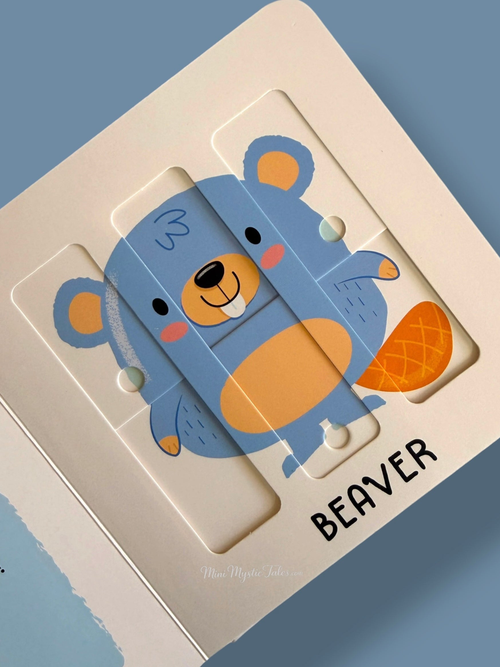 Completed beaver sliding puzzle in My First Sliding Puzzles Countryside Animals educational board book for preschool children