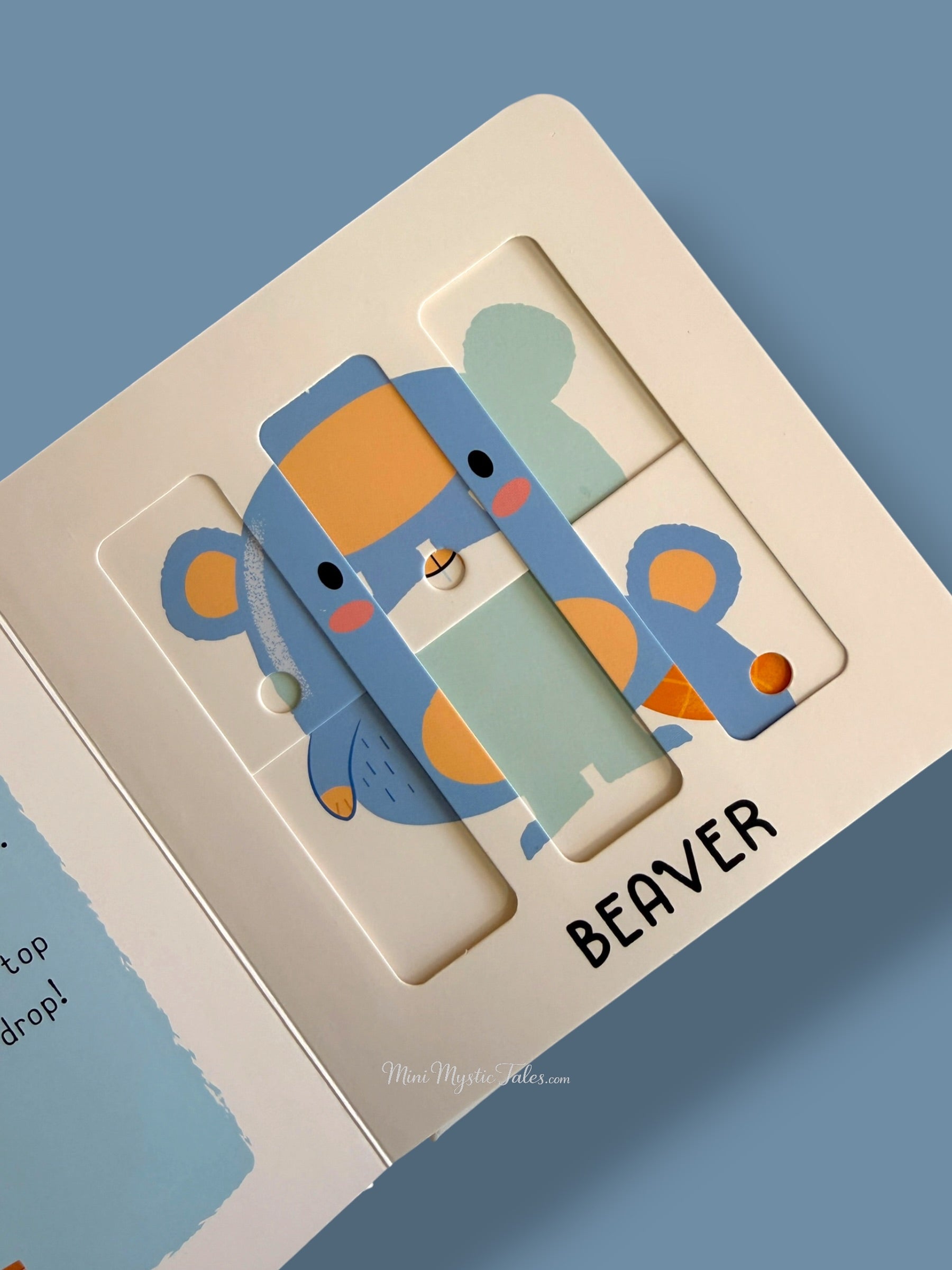 Interactive beaver sliding puzzle page from My First Sliding Puzzles Countryside Animals board book for toddlers