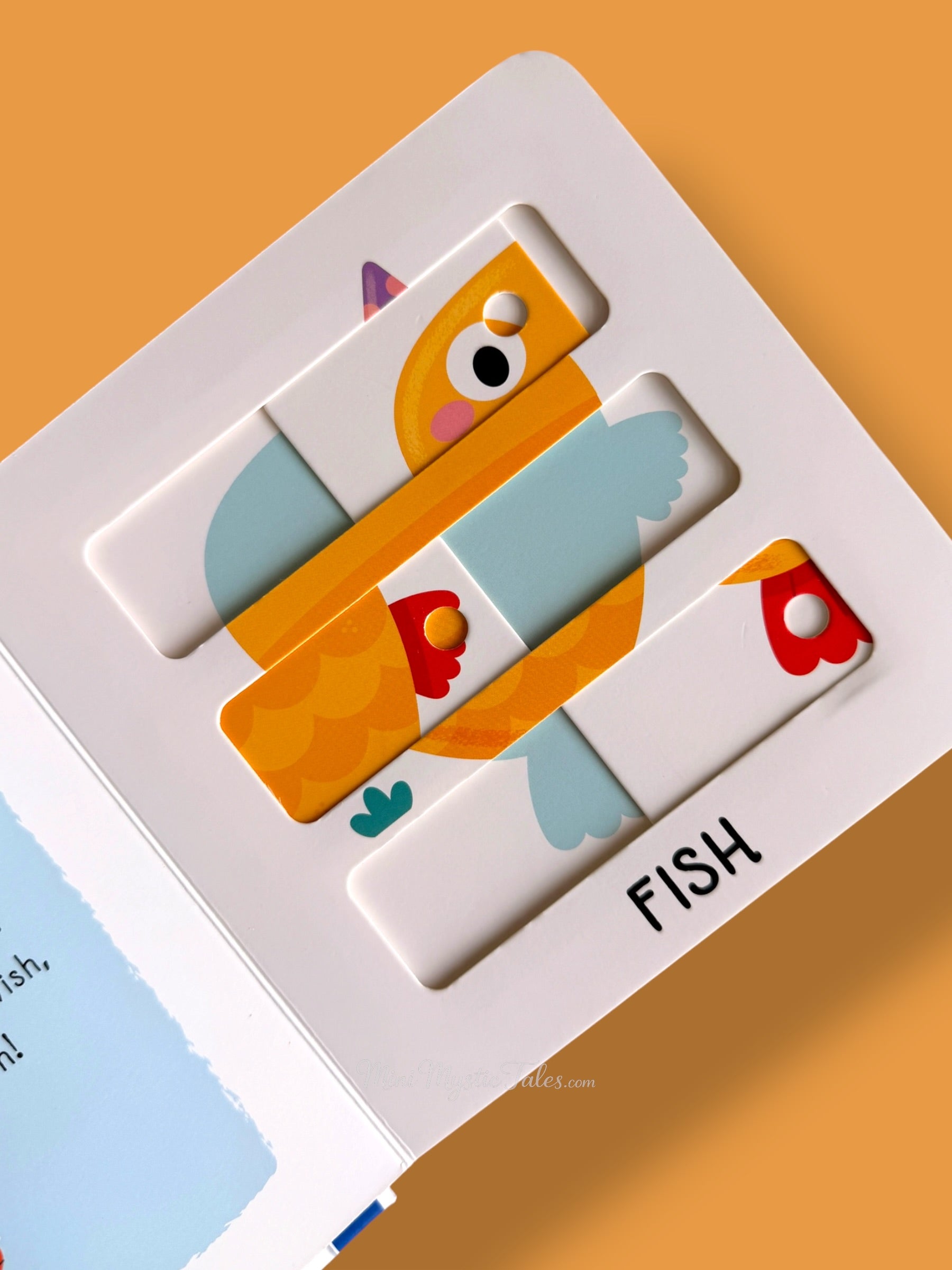 Ocean animals sliding puzzle book page featuring a colorful fish puzzle challenge for toddlers
