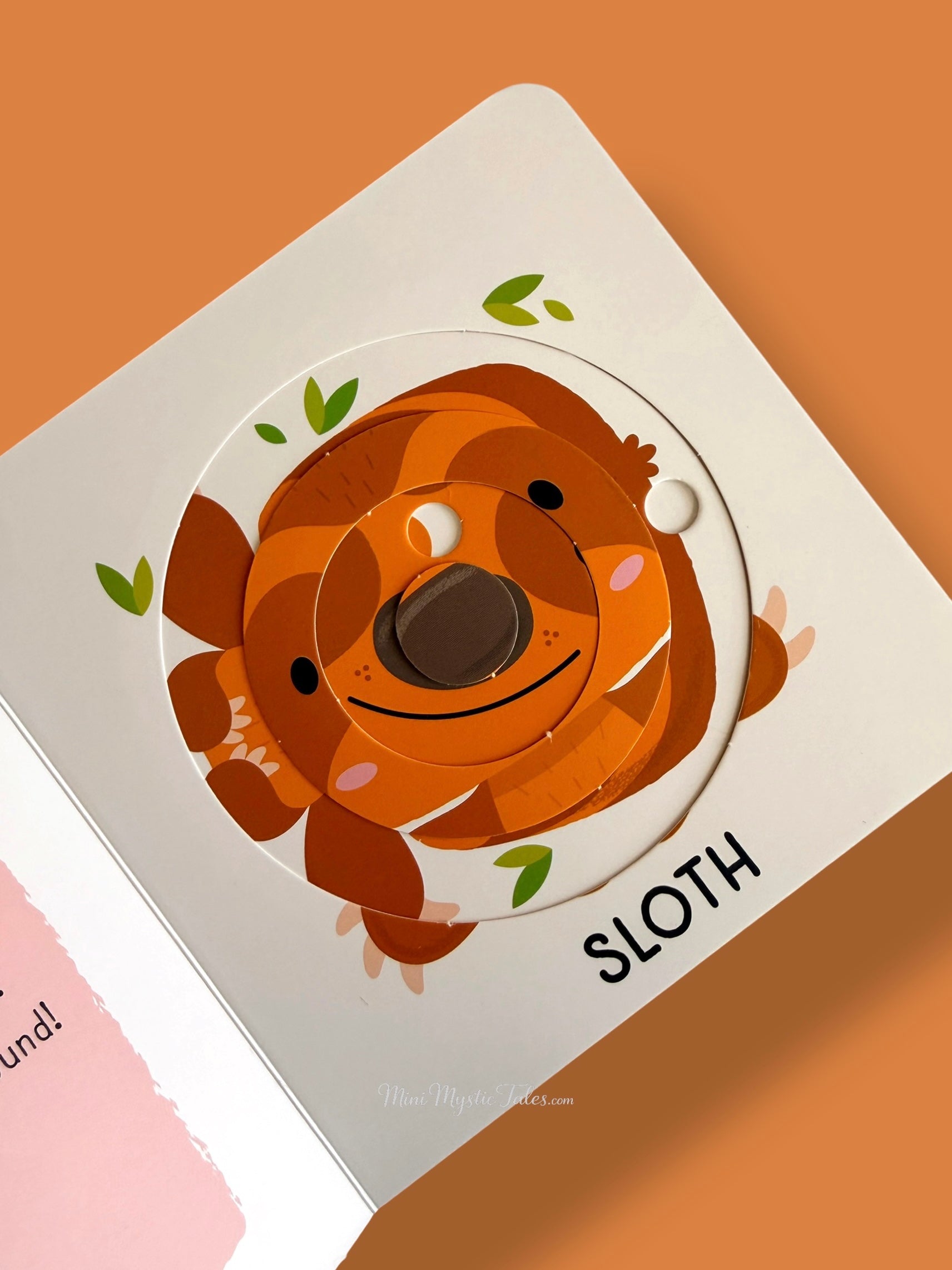 Interactive rotating sloth puzzle activity from My First Sliding Puzzles Zoo Animals board book for toddlers
