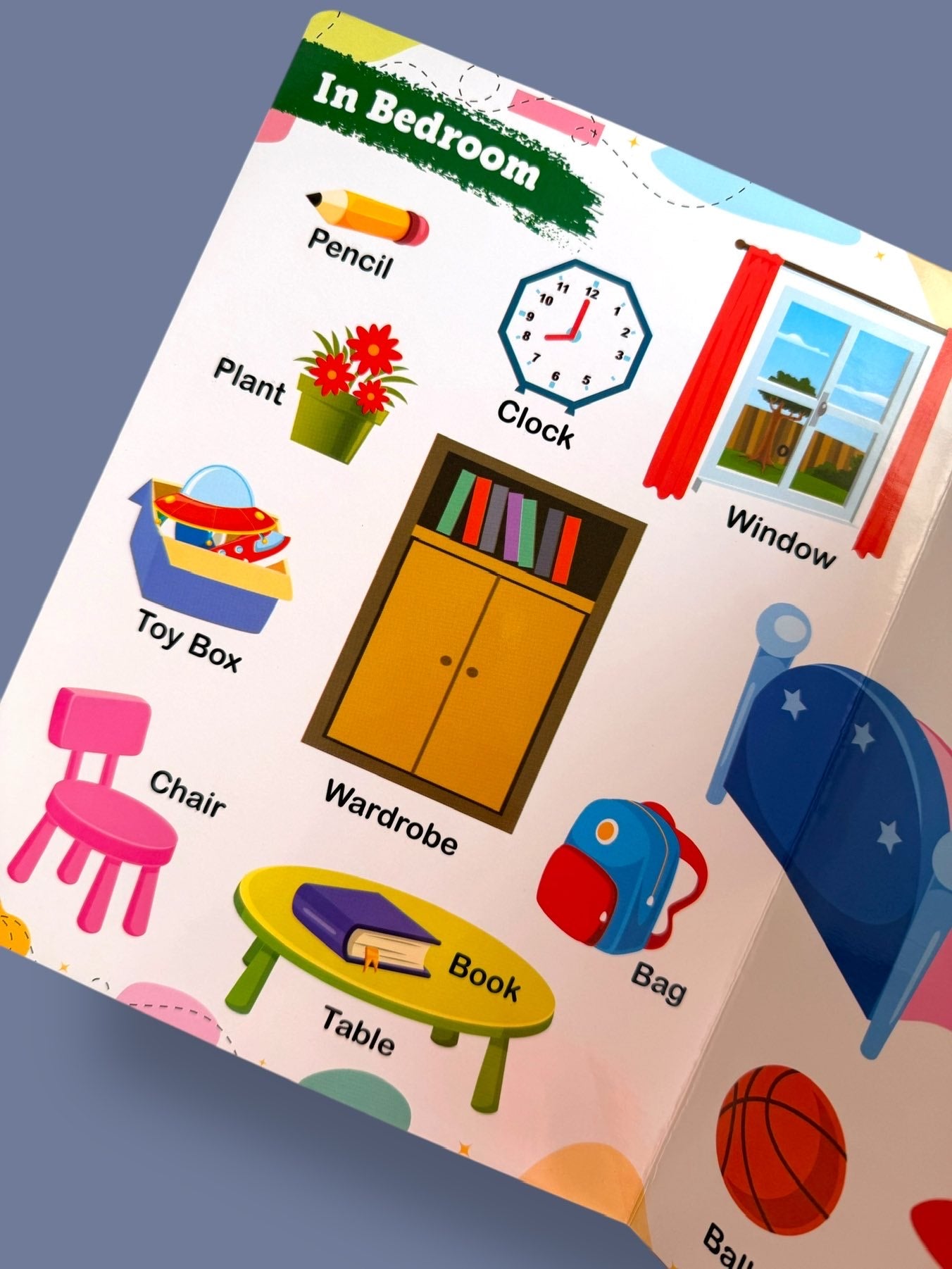 My First Words board book page featuring bedroom vocabulary including pencil, plant, clock, window, wardrobe, chair, table, book, and bag for toddlers