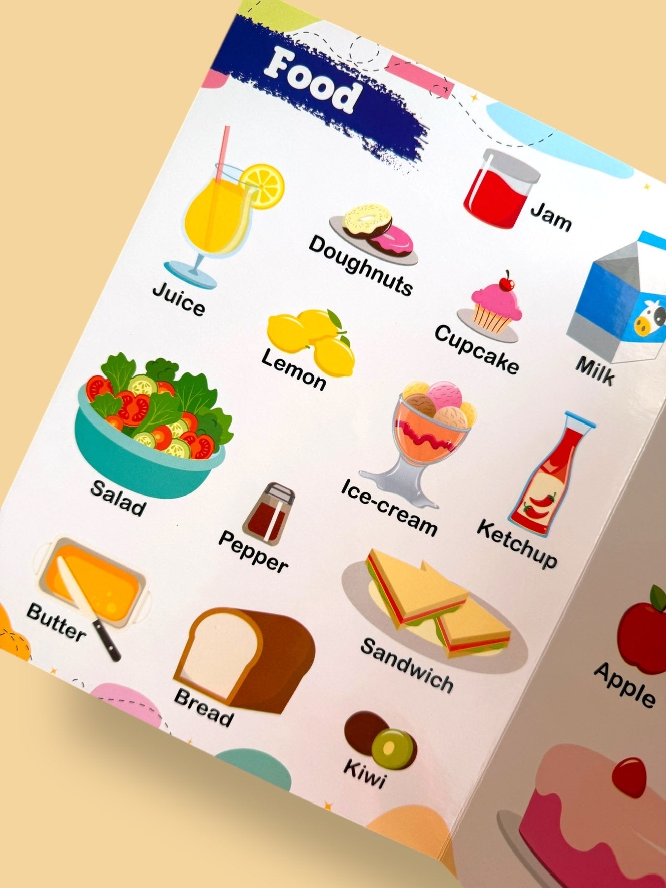 My First Words board book page featuring food vocabulary including juice, doughnuts, jam, milk, cupcake, salad, ice cream, bread, sandwich, and ketchup