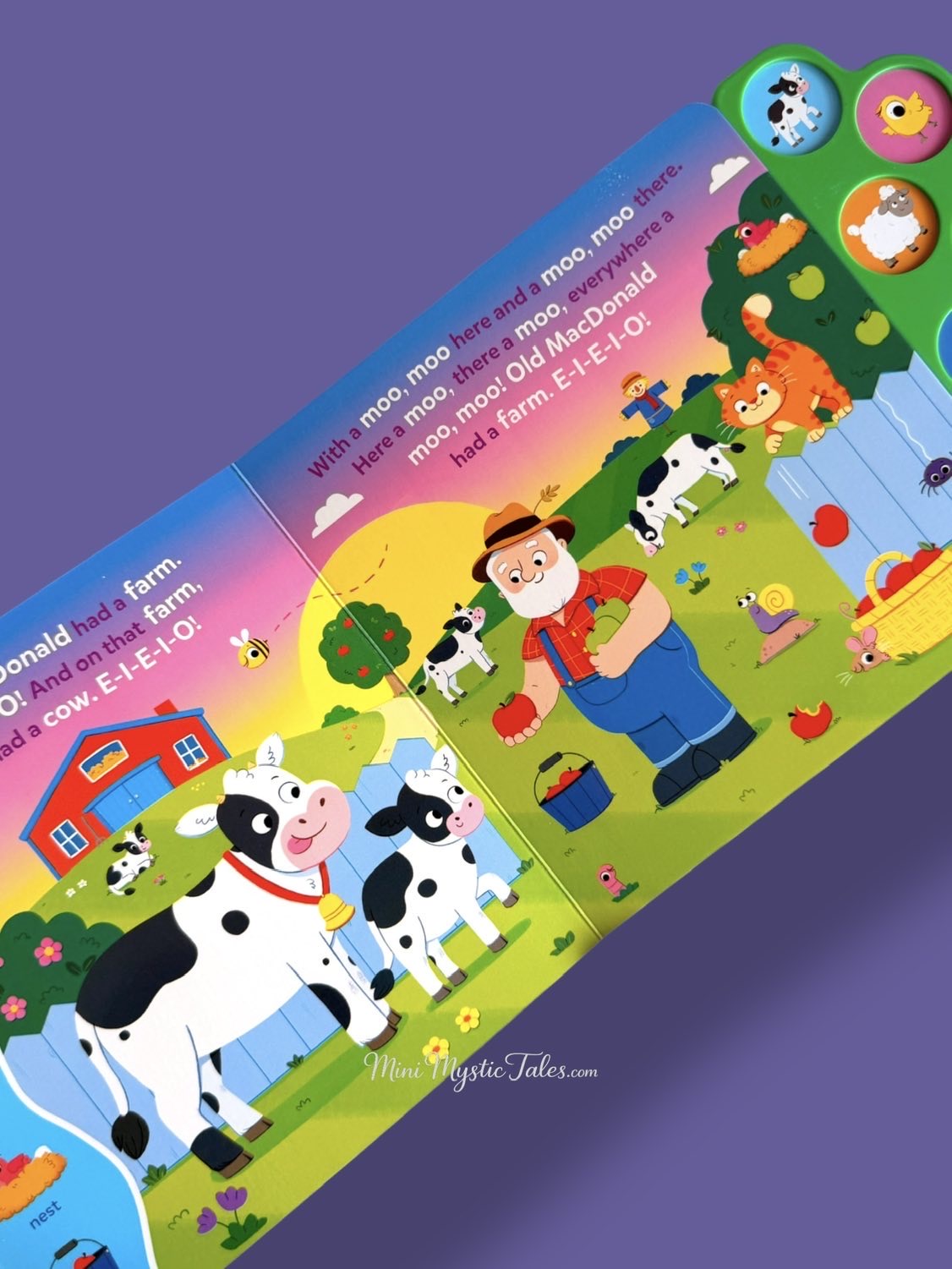 Inside page of the Search & Find Old MacDonald Had A Farm sound book featuring cows, the farmer, sing-along lyrics, and interactive search-and-find activities.