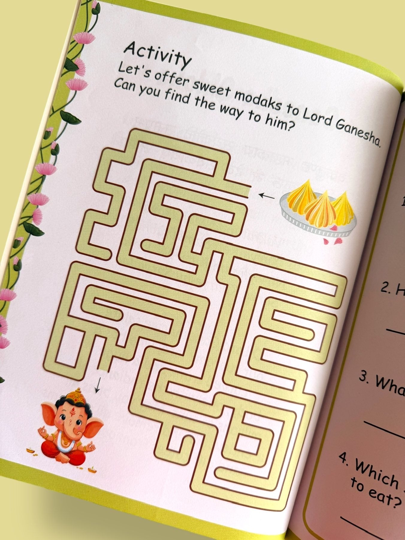 Ganesha maze activity page for kids to help Lord Ganesha reach the modaks in a fun devotional learning activity book