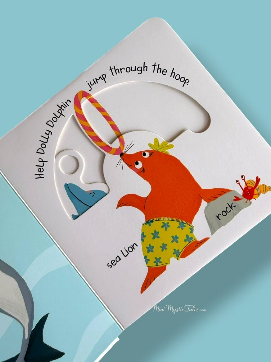 Slide and Peek In The Ocean interactive page featuring a dolphin, sea lion and movable slider activity for toddlers.