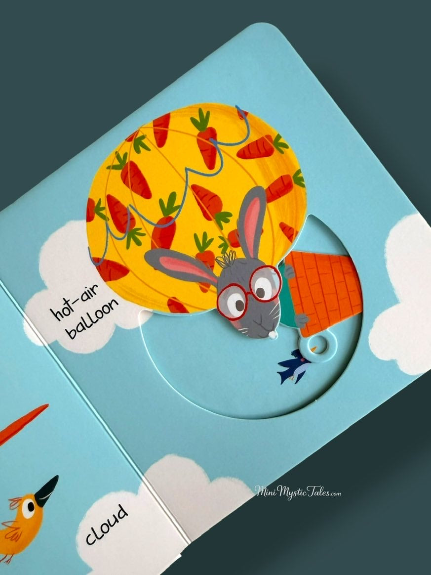 Slide and Peek On The Move interactive page featuring a colourful hot-air balloon and movable mechanism for toddlers.