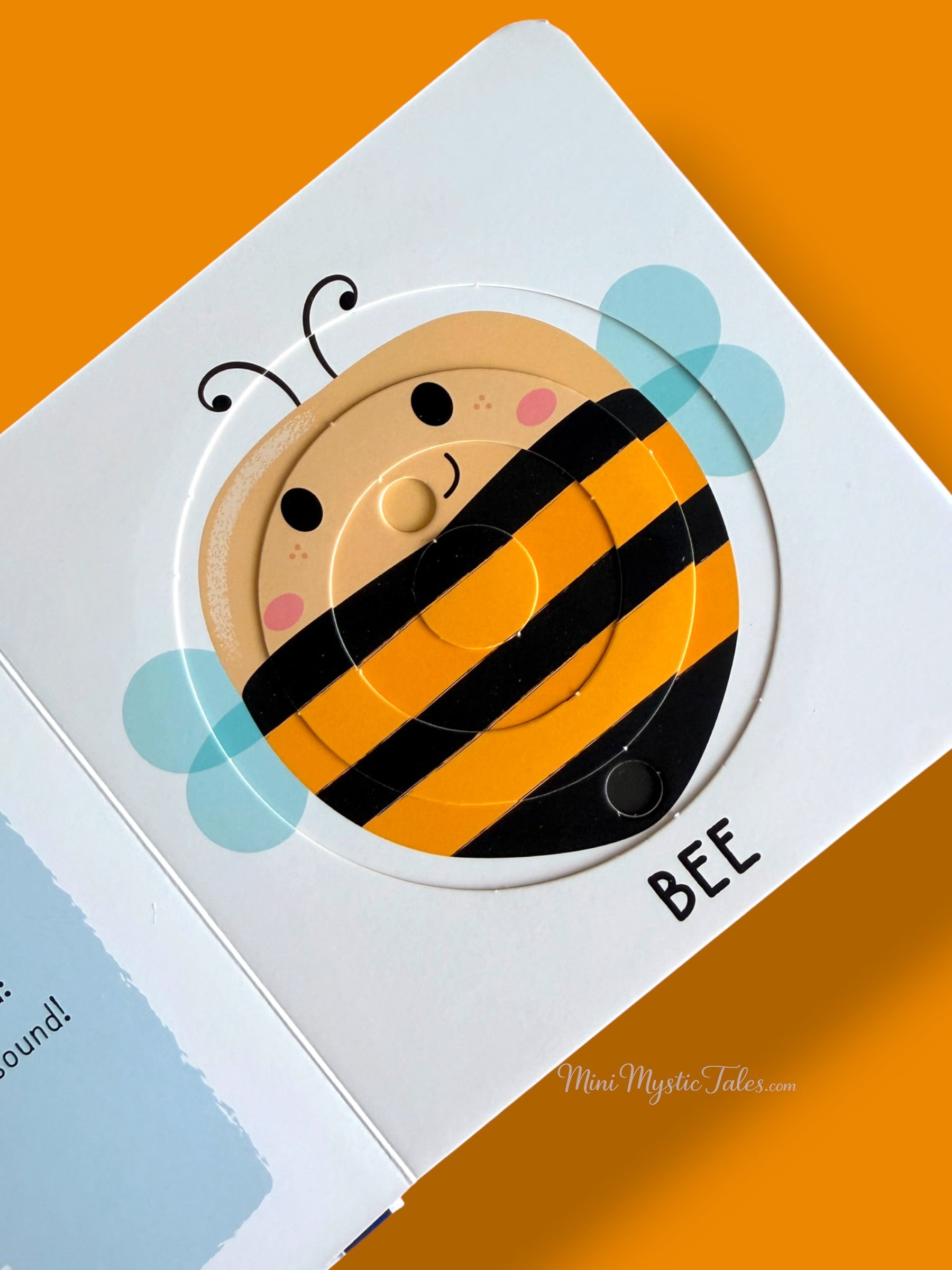 Completed bee puzzle in an interactive board book featuring cute small animals for toddlers