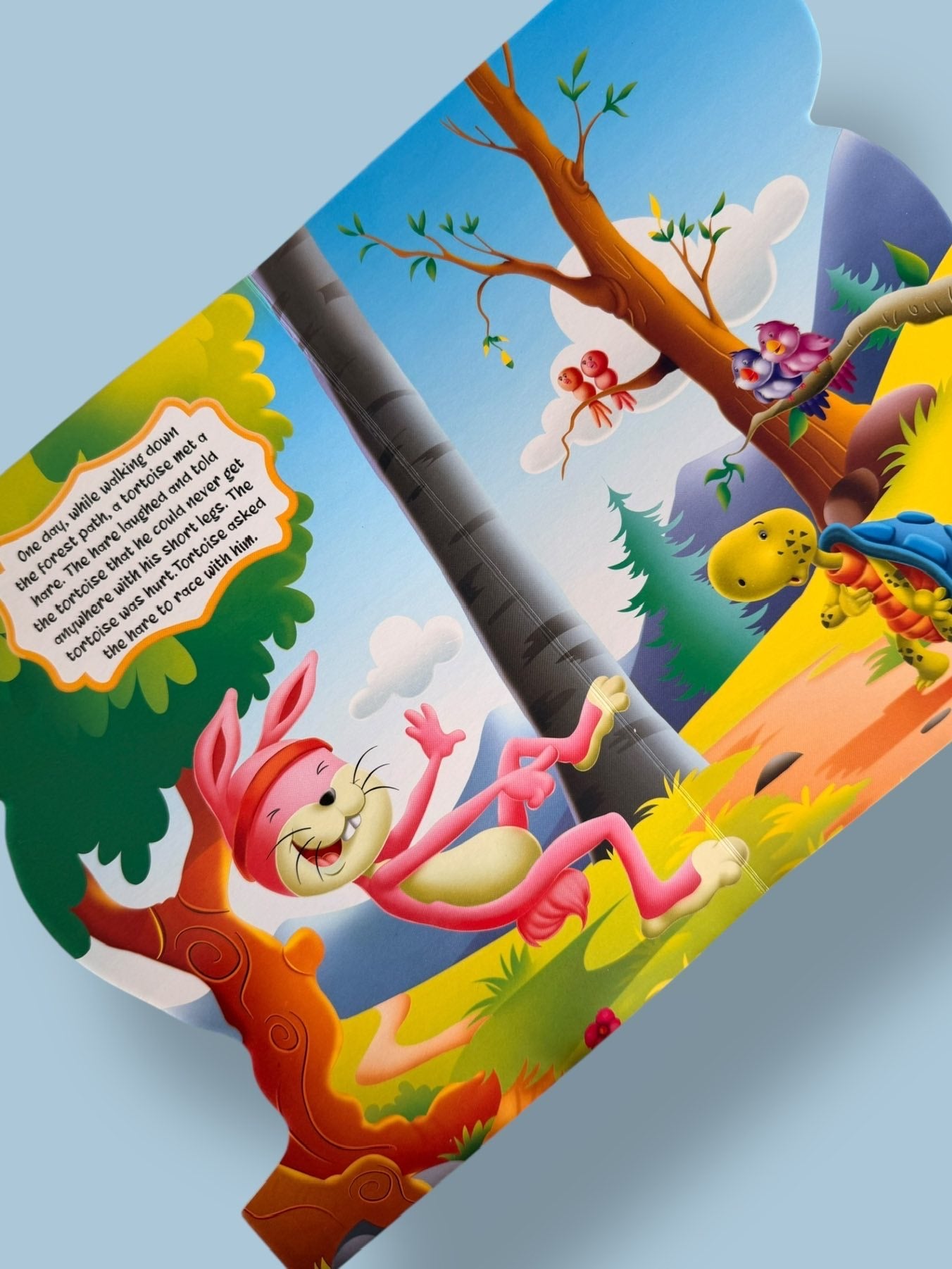 Inside pages of The Hare and the Tortoise Story Board Book showing the famous race between the speedy hare and the determined tortoise