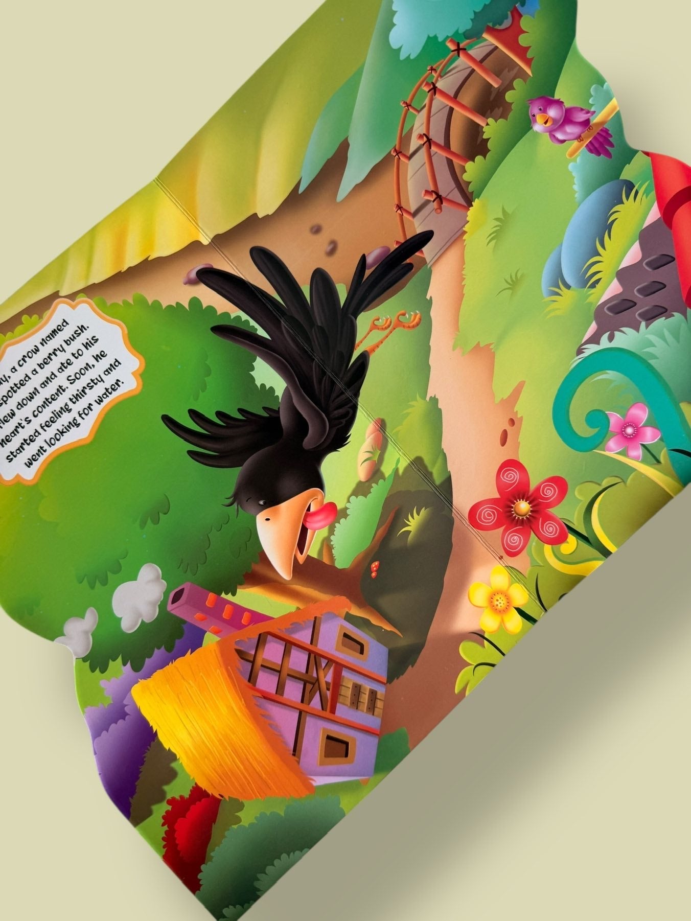 Inside pages of The Thirsty Crow Story Board Book showing the thirsty crow searching for water in a colourful illustrated village scene
