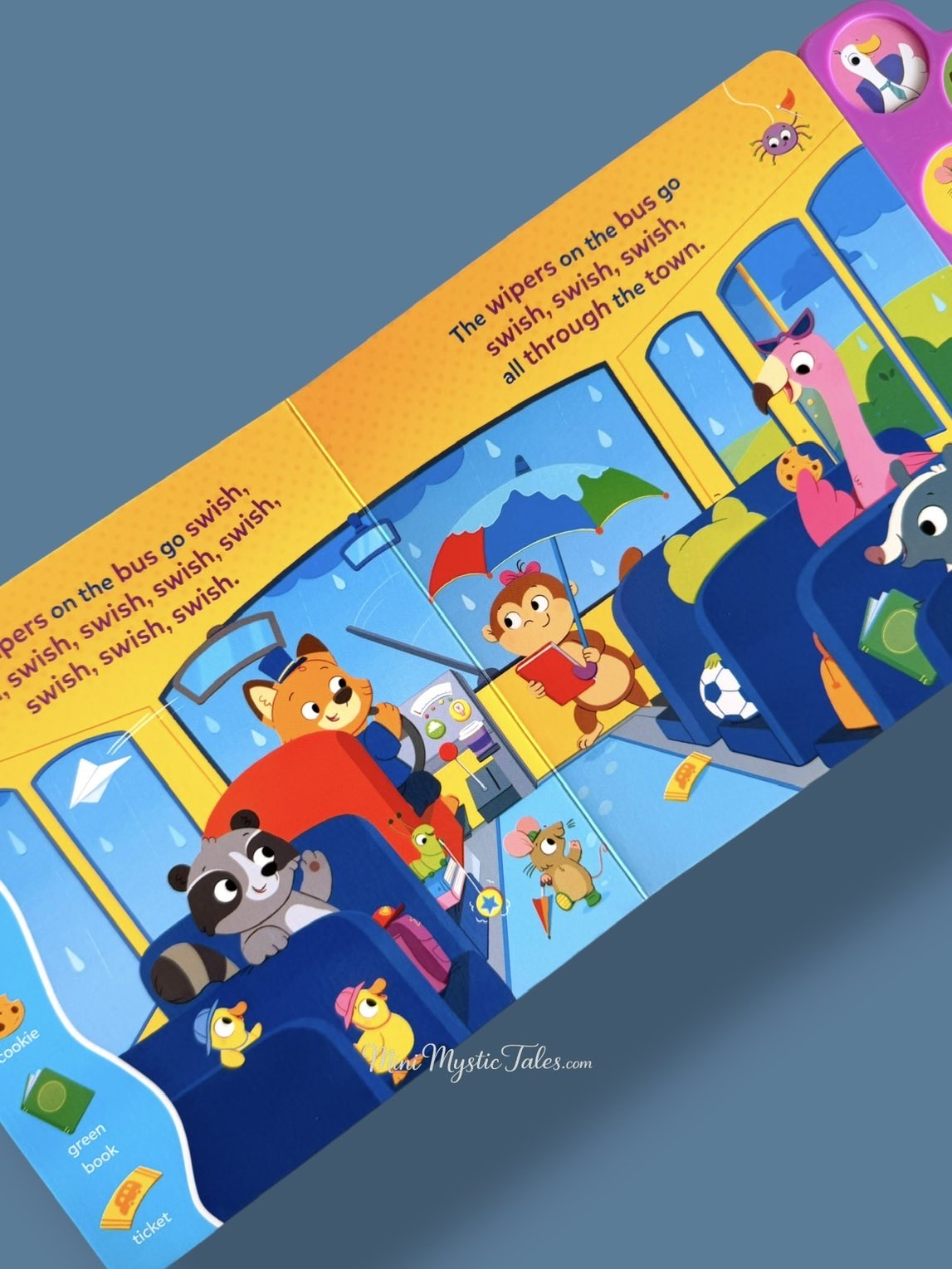 Interactive pages from The Wheels on the Bus sound book showing the ‘wipers go swish’ rhyme with engaging illustrations and sound buttons.