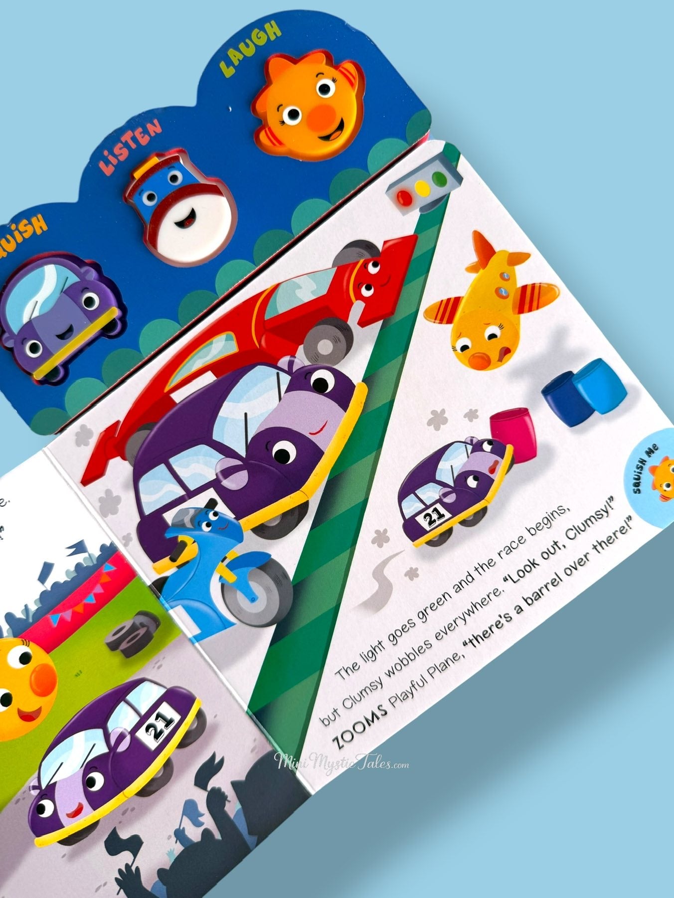 Interactive Things That Go sound book page with race cars, motorcycle and airplane encouraging sound-based learning