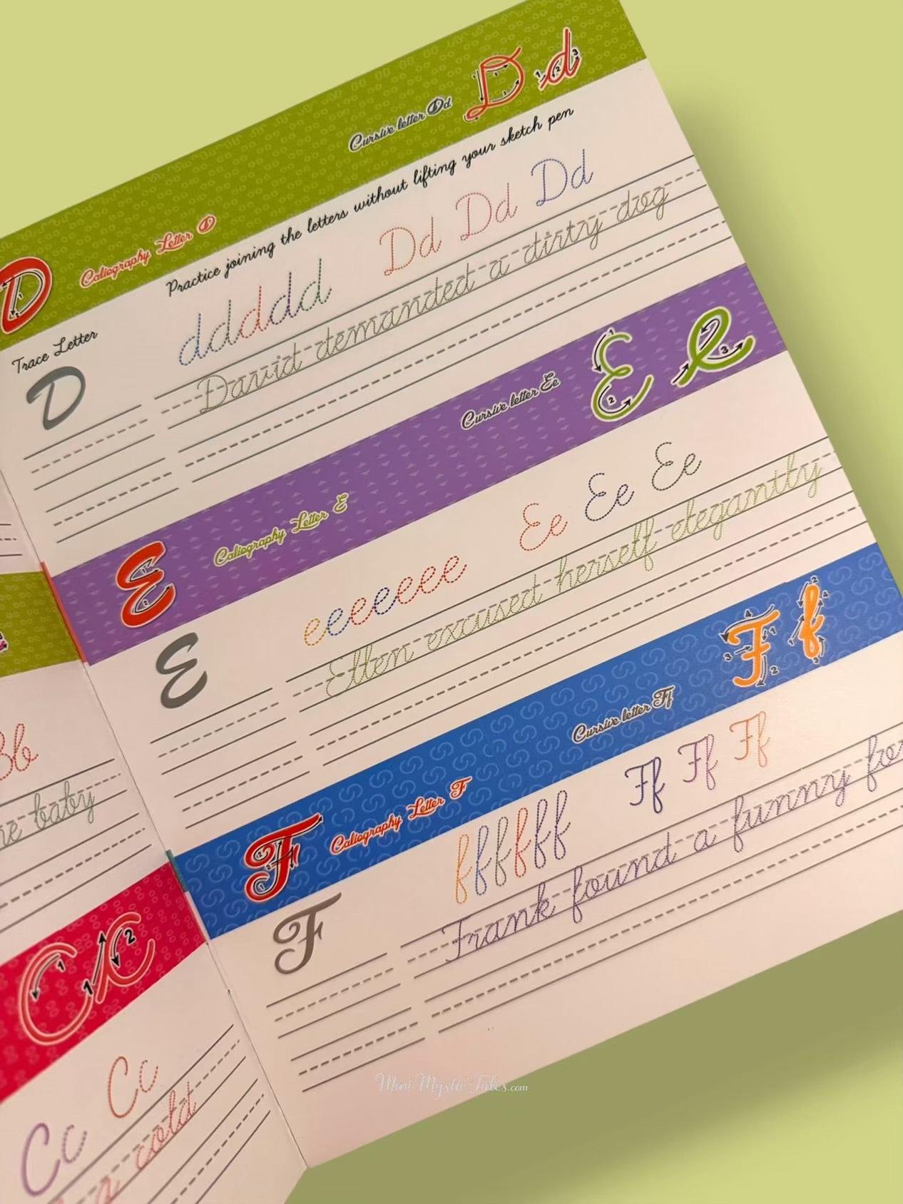 Reusable cursive alphabet handwriting practice page with uppercase and lowercase English cursive letters and tracing exercises